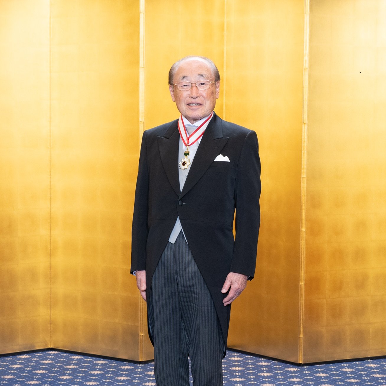 Nomination de M. Shigeatsu Tominaga à l'Ordre du Soleil Levant, Rayons d'Or en Sautoir du gouvernement japonais